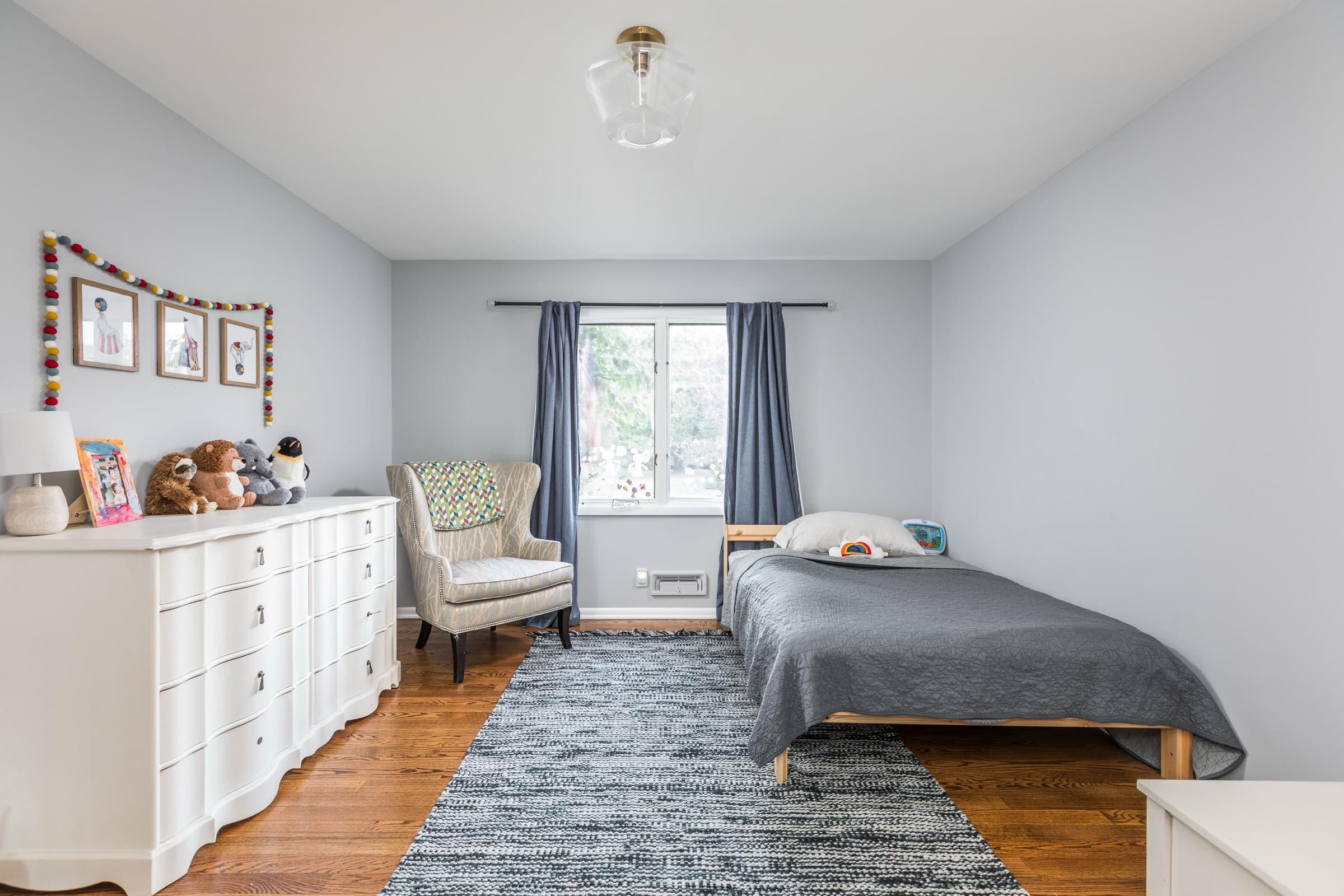 Child's bedroom with globally inspired decor and layered textiles